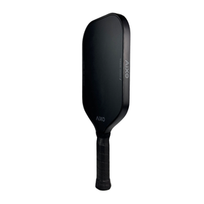 Side profile of AIXO Ghost Ultra Noir paddle highlighting its cold-pressed carbon construction for superior feel.